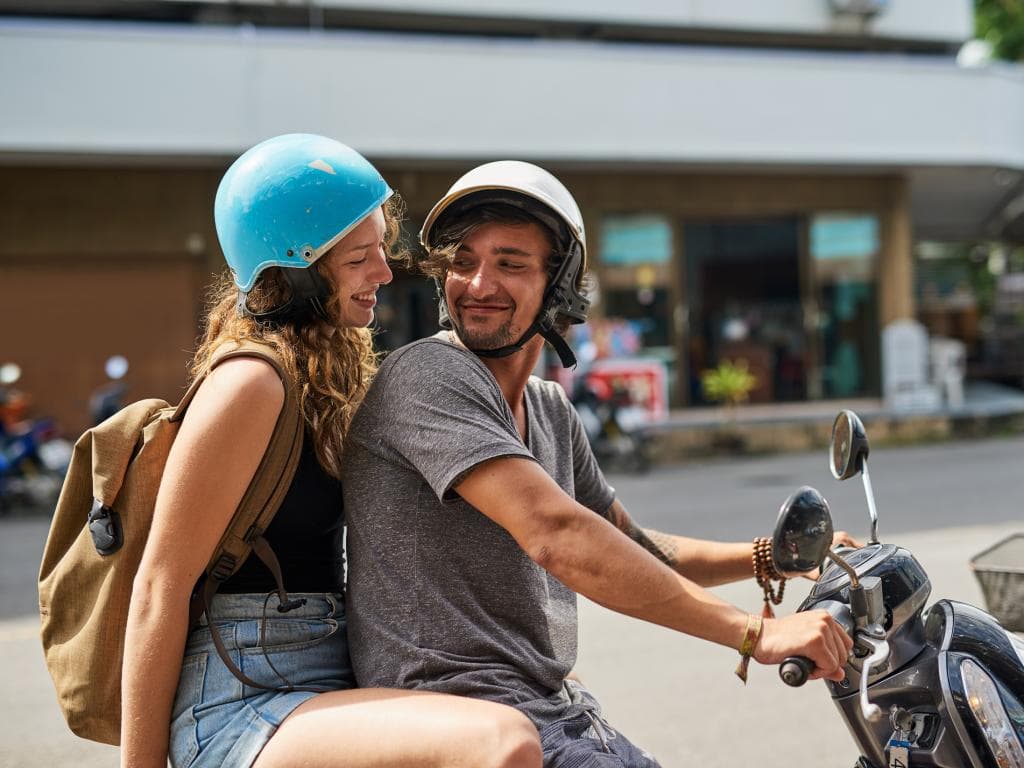 A couple on a motorbike